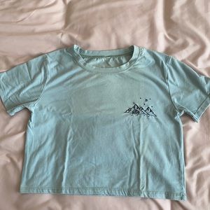 Light blue short sleeve crop top with stitching